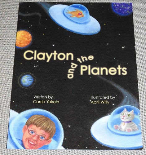 Clayton and the planets av Carrie Yakola Häftad bok. Signed 2009