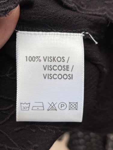 Flash Woman svart tunika, storlek S