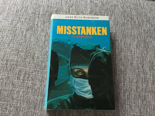MISSTANKEN av LEAH RUTH ROBINSSON . EN SJUKHUSTHRILLER .