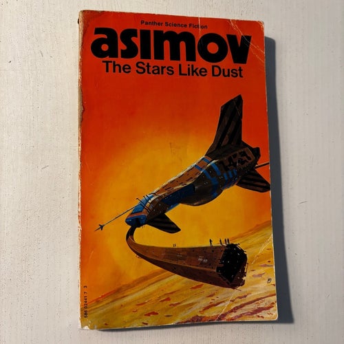 Pocket - The Stars Like Dust av Isaac Asimov, 1976