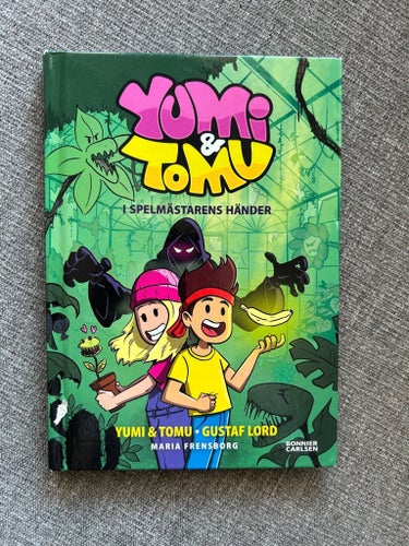 Yumi & Tomu: I Spelmästarens Händer bok