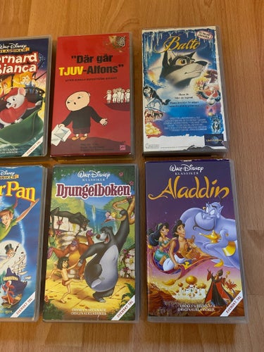 VHS-filmer: Shrek, Bernard & Bianca, Peter Pan, Djungelboken, Aladdin, Balto,
