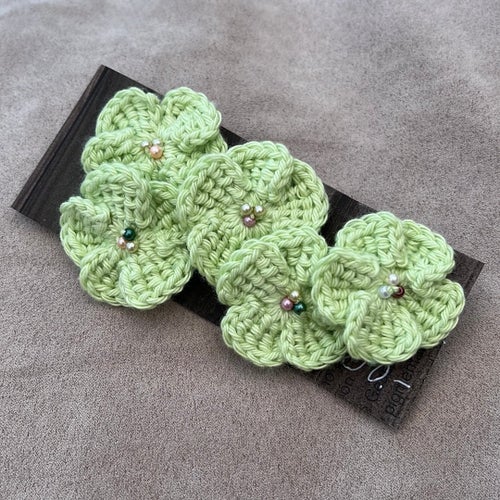 5 st ljusgröna blommor