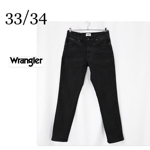 WRANGLER TEXAS SLIM JEANS storlek 33 / 34 .