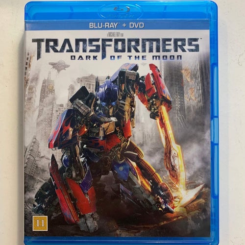 TRANSFORMERS - DARK OF THE MOON. BLU-RAY + DVD. ACTION -11.