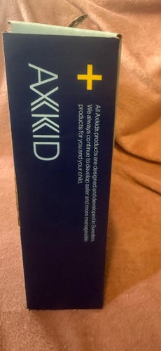 Axkid Suncower solskydd bilbarnstol svart