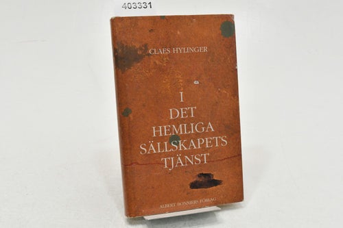 I det hemliga sällskapets tjänst : roman / Claes Hylinger.