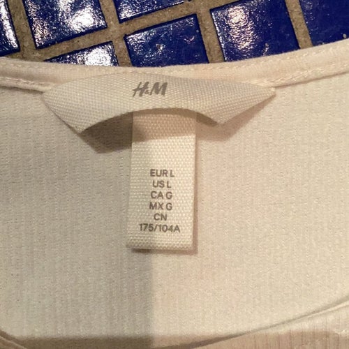 H&M vit klänning, storlek L för stranden kanske