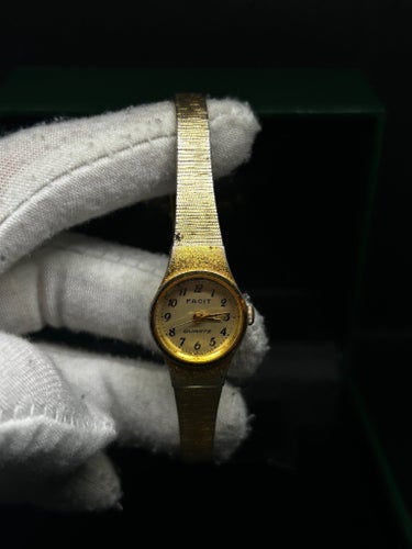 Facit quartz klocka guldfärgad boett integrerad länk vintage