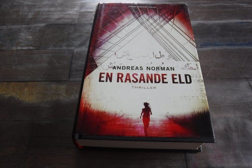 En rasande eld, författare Andreas Norman