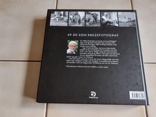 Fotograf - Tor Wiklund. 49 år som pressfotograf 1954-2003. Foto-bok. 2013.