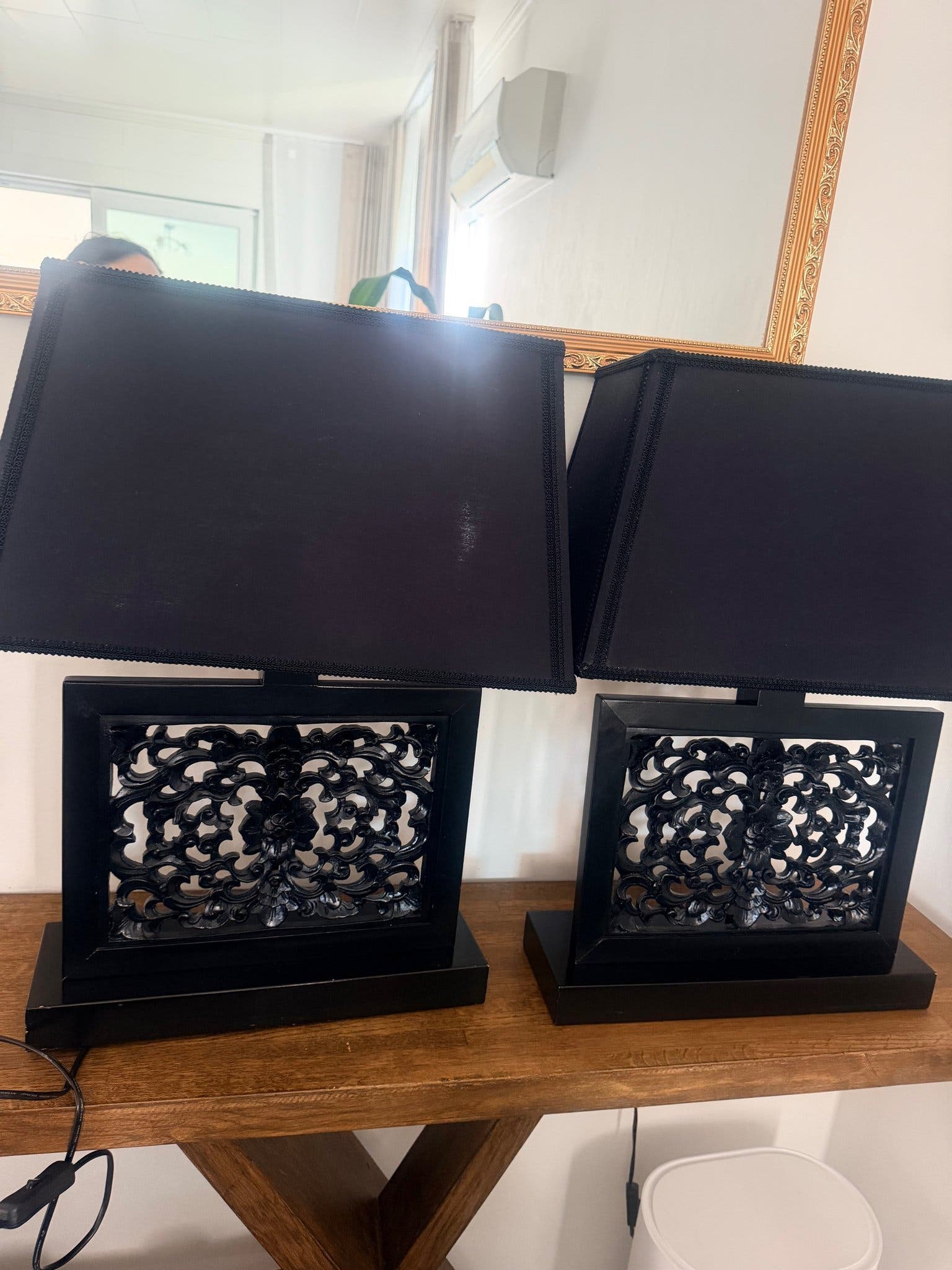 Black table lamps with cut-out decoration and fabric shade