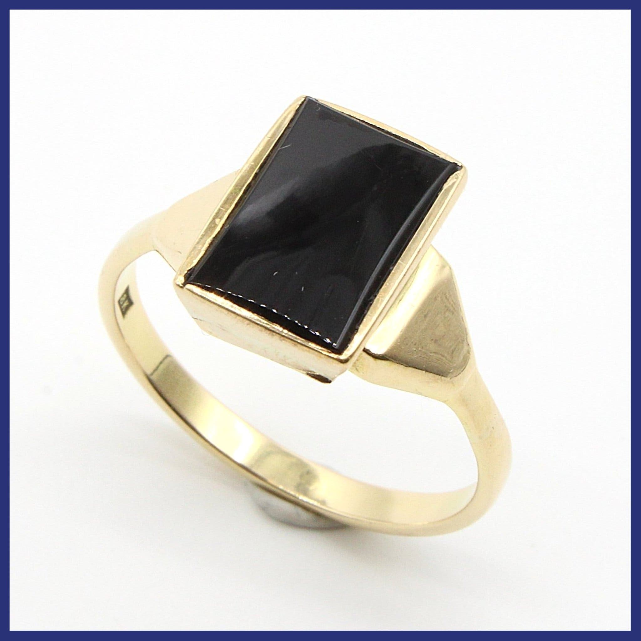 Ring, 18K guld, svart sten, vintage (vikt 3,6g, stl 19,50mm)