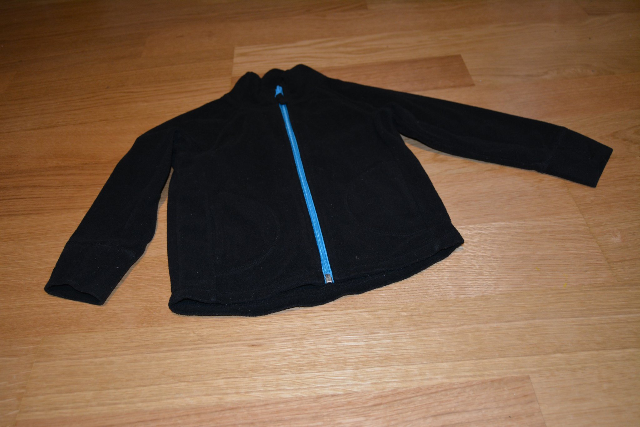 Svart fleece jacka med turkos dragkedja (410386276) ᐈ Köp