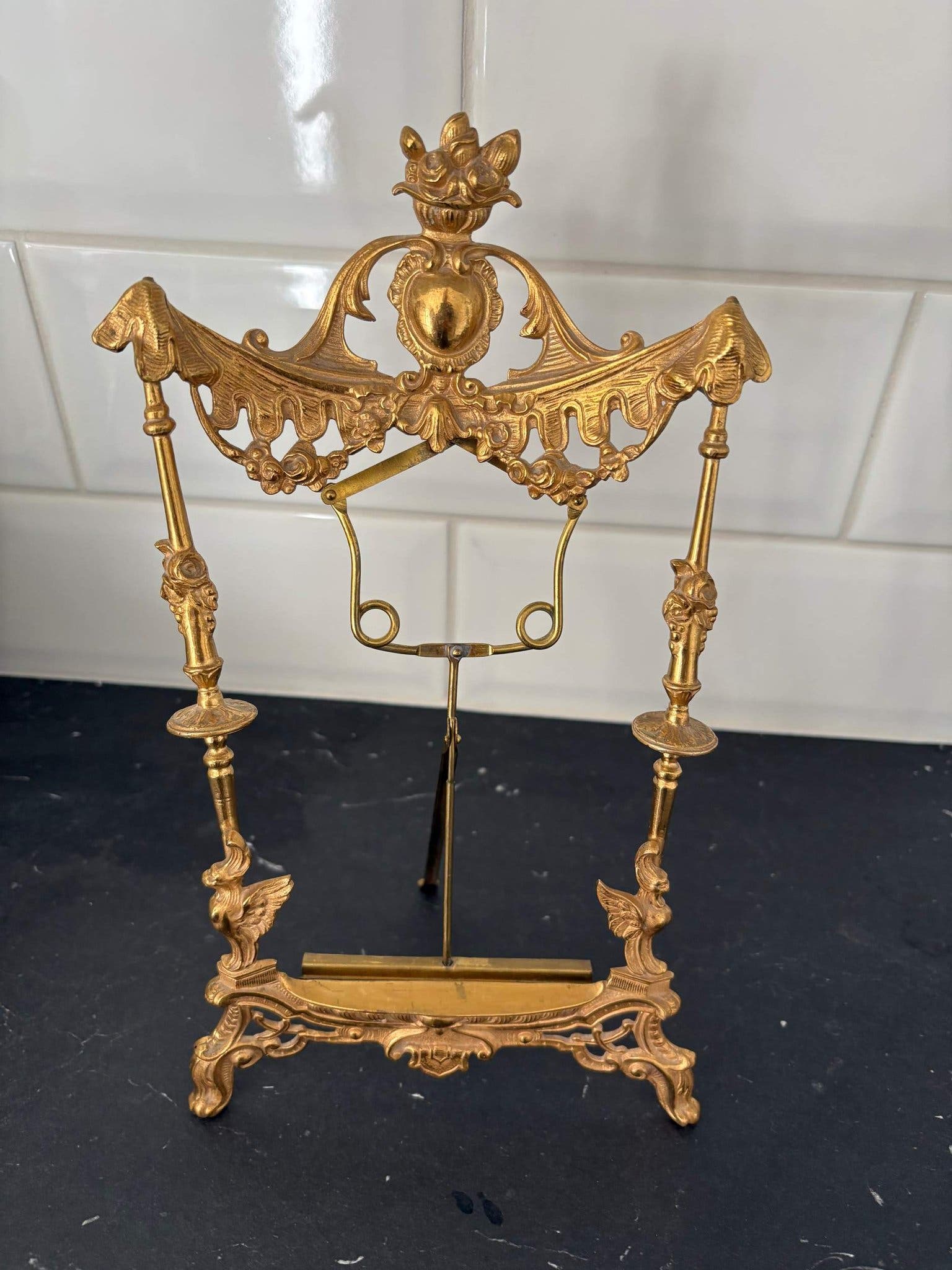 brass picture frame, approximately 29 cm tall, one piece