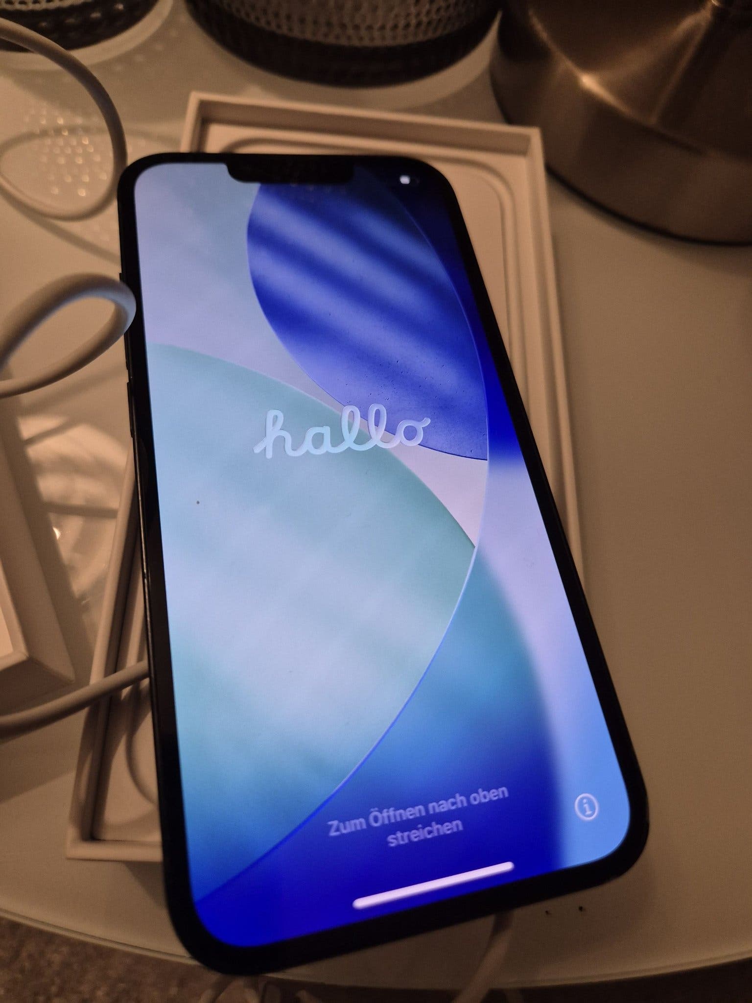 iPhone 13 with 128 GB storage available at auction