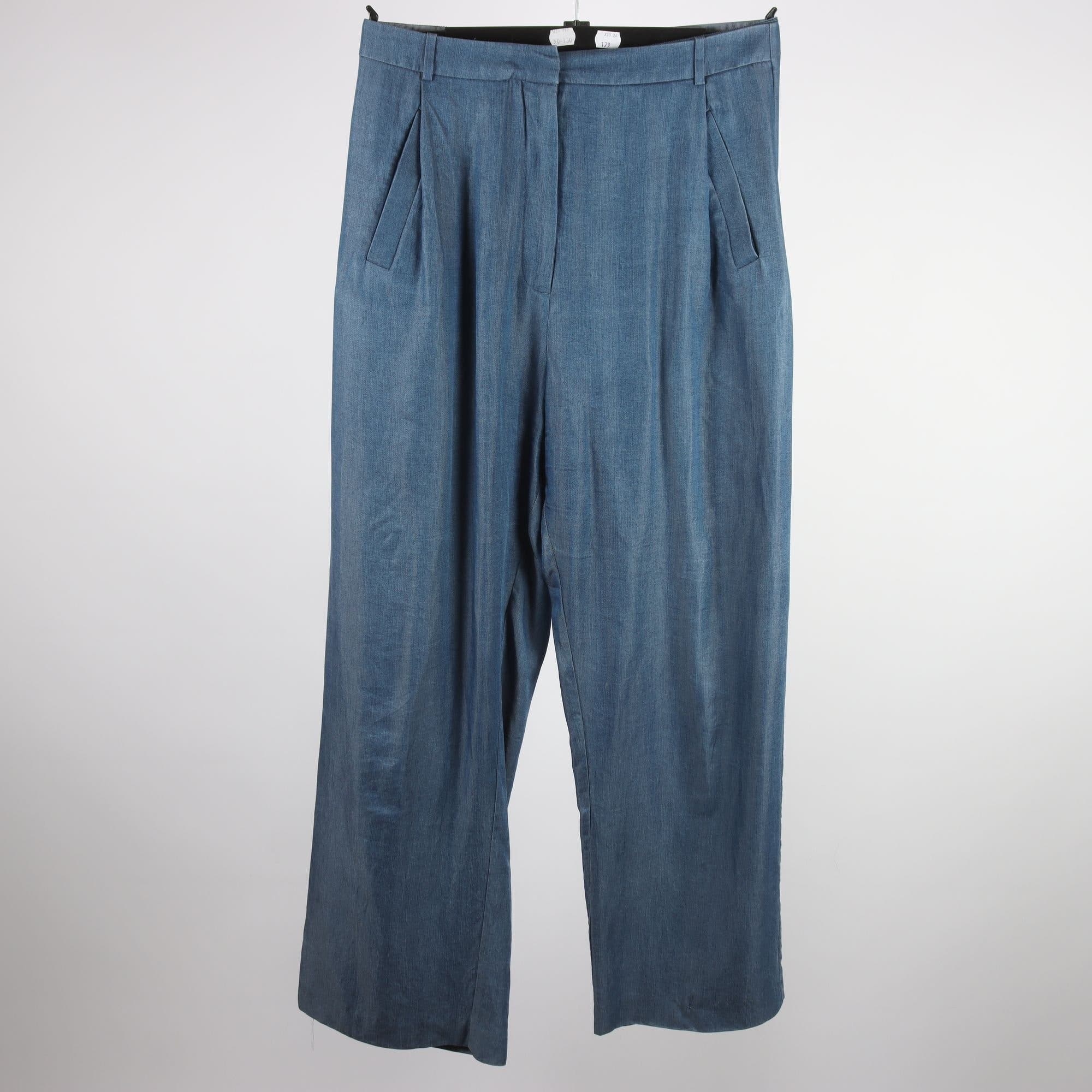 Acne blue trousers size 38 for auction
