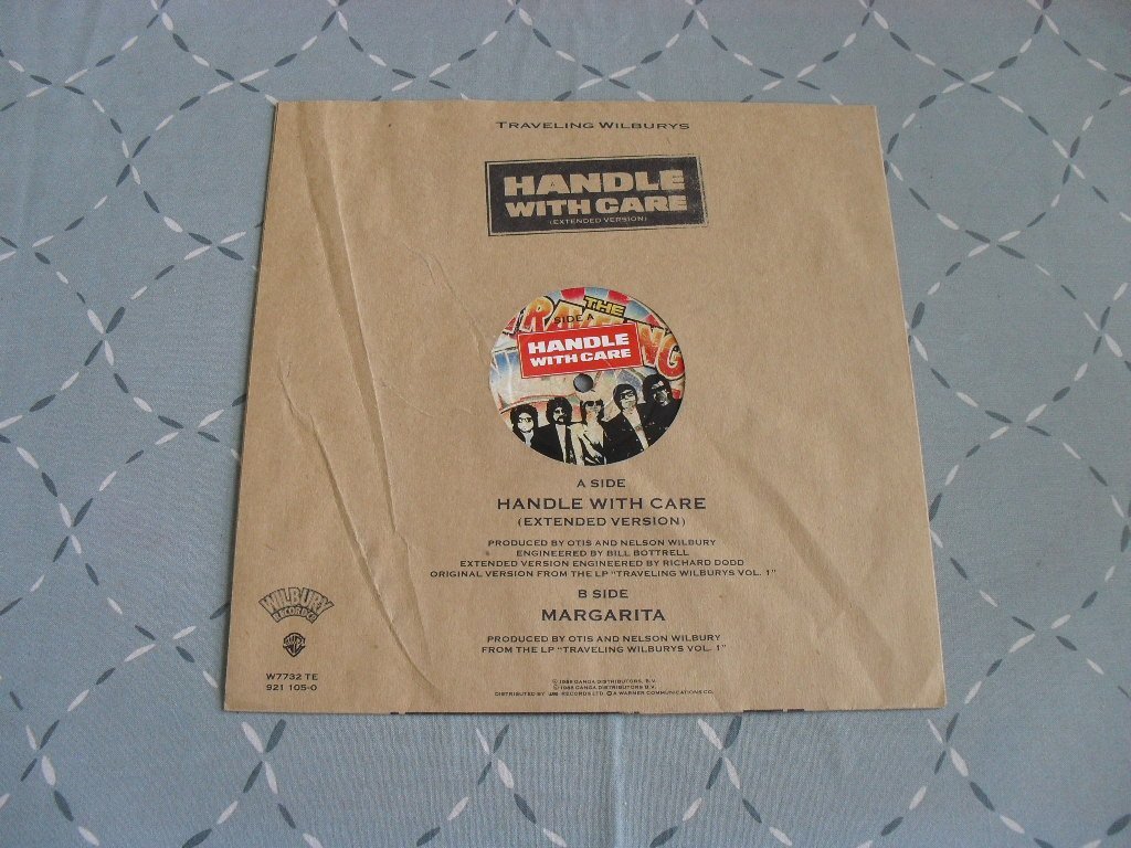 TRAVELING WILBURYS handle with care 10" (409523669) ᐈ Köp på Tradera