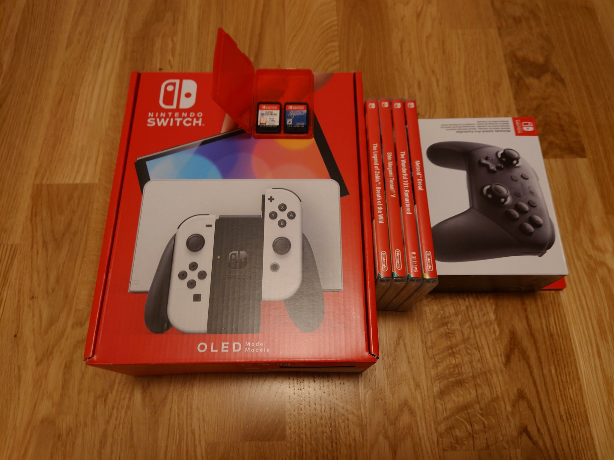 Nintendo Switch OLED + Pro Kontroll + 6 spel