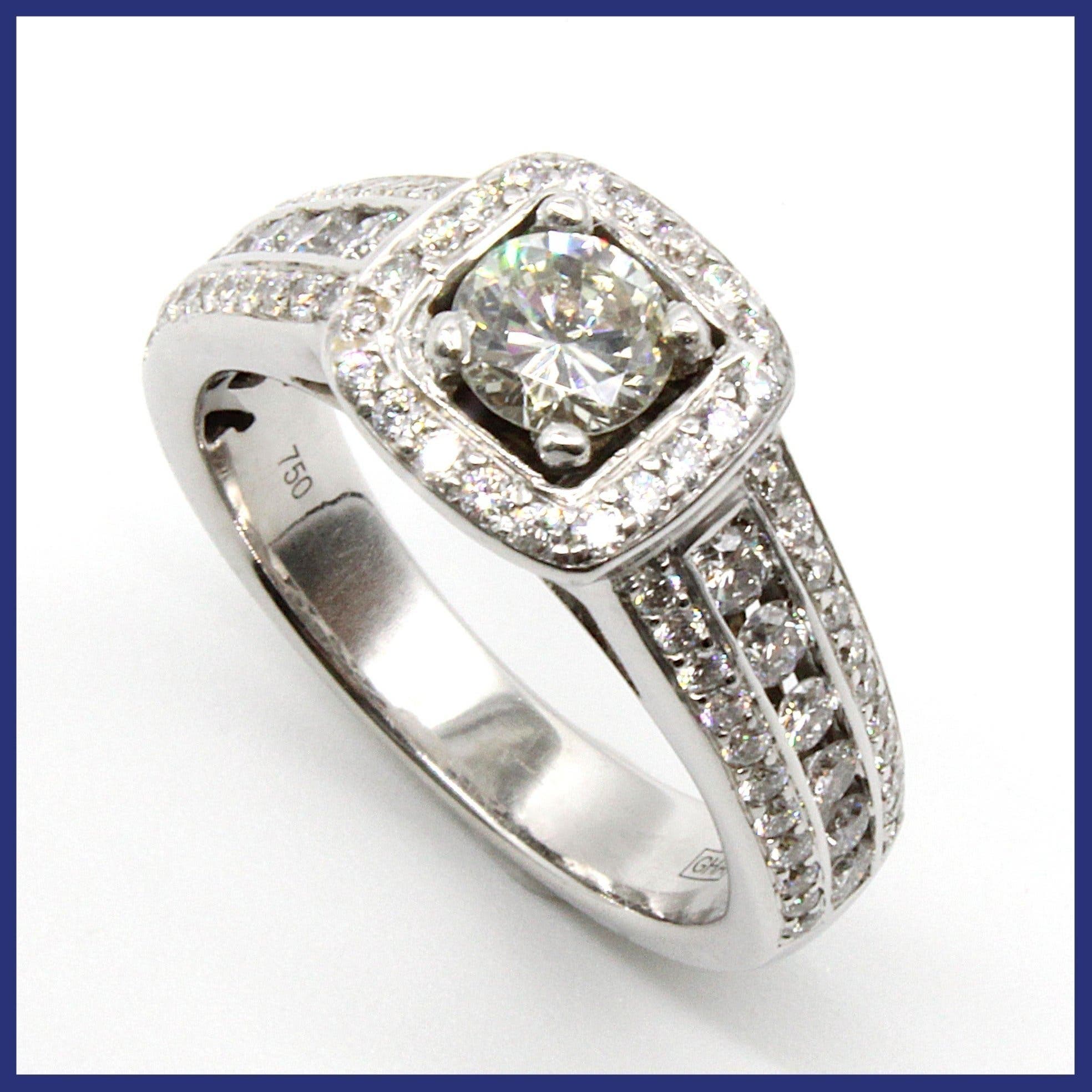 Ring, 18K vitguld, halo/pavé, naturliga diamanter (0,84ctv, stl 15,1mm)