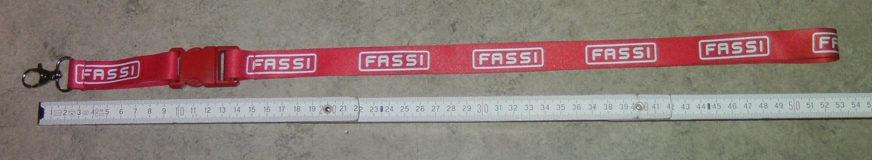Nyckelband med reklam för Fassi | Köp på Tradera (661873934)
