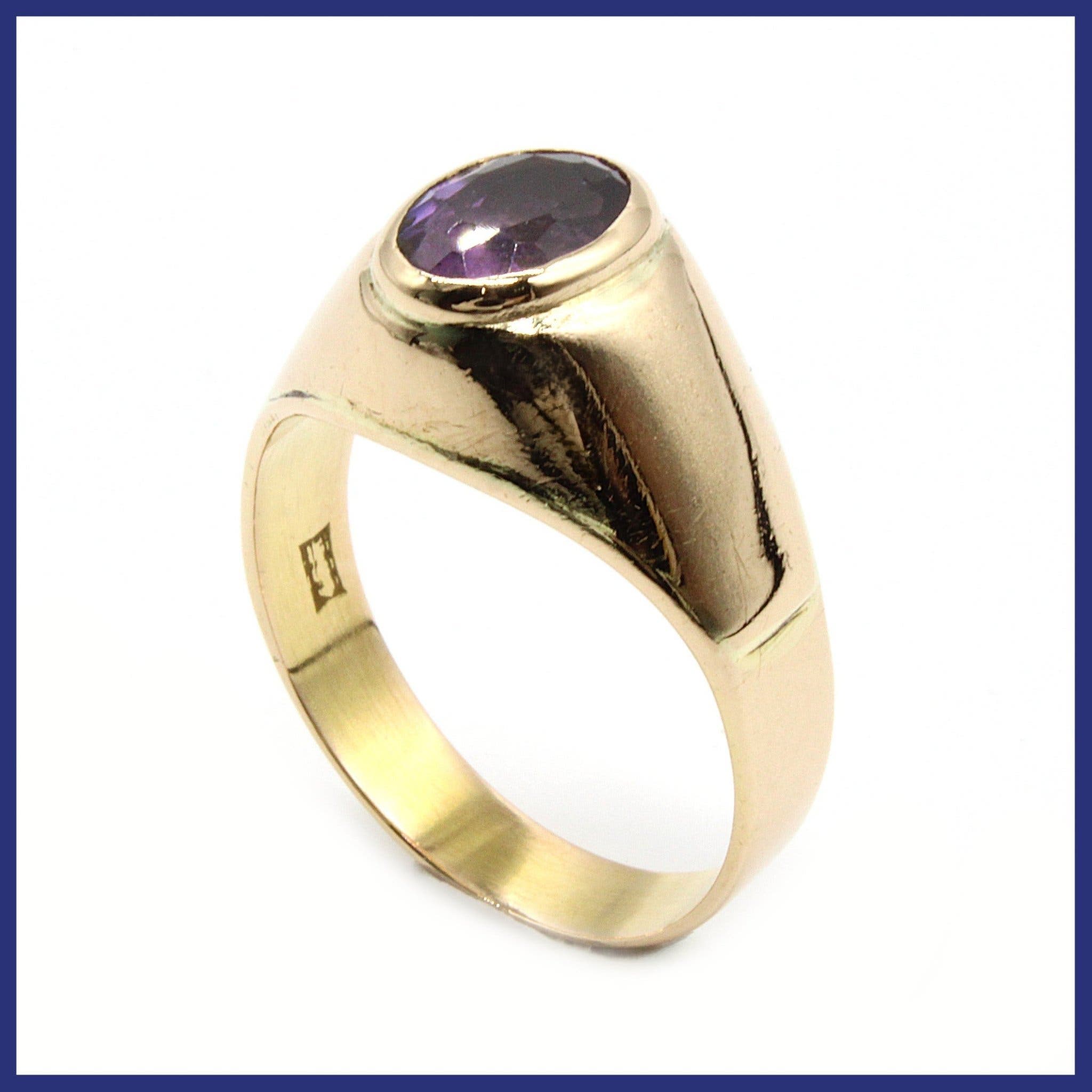 Ring, 18K guld, lila sten (vikt 5,29g, stl 18,2mm)