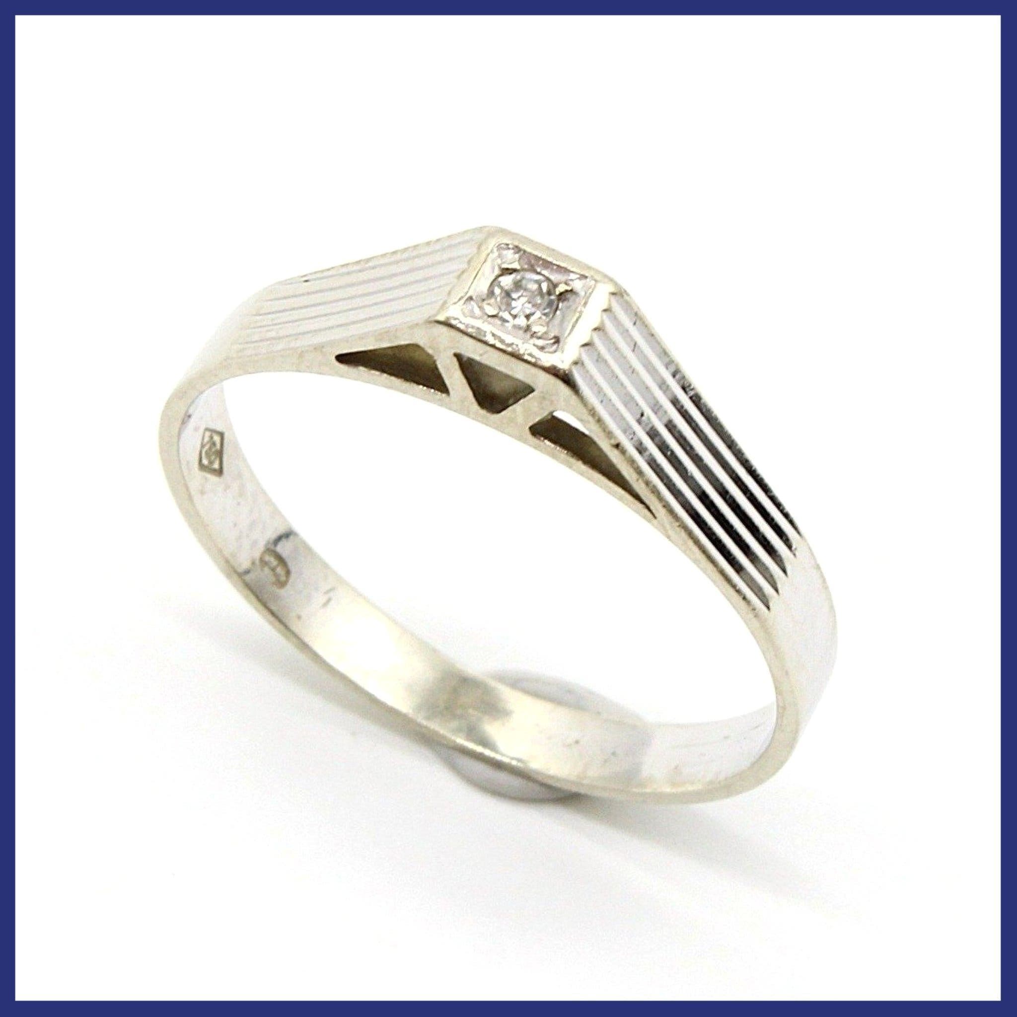 Ring, 18K vitguld, solitär naturlig briljantslipad diamant (0,015ct, stl 16,5mm)