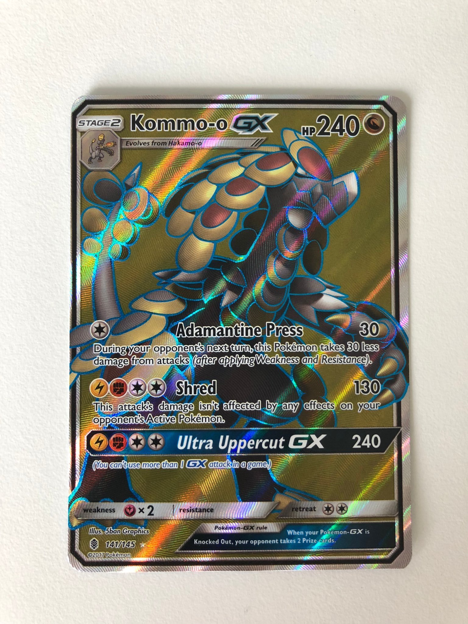 Kommoo GX 141/145 Full Art Guardians Ris