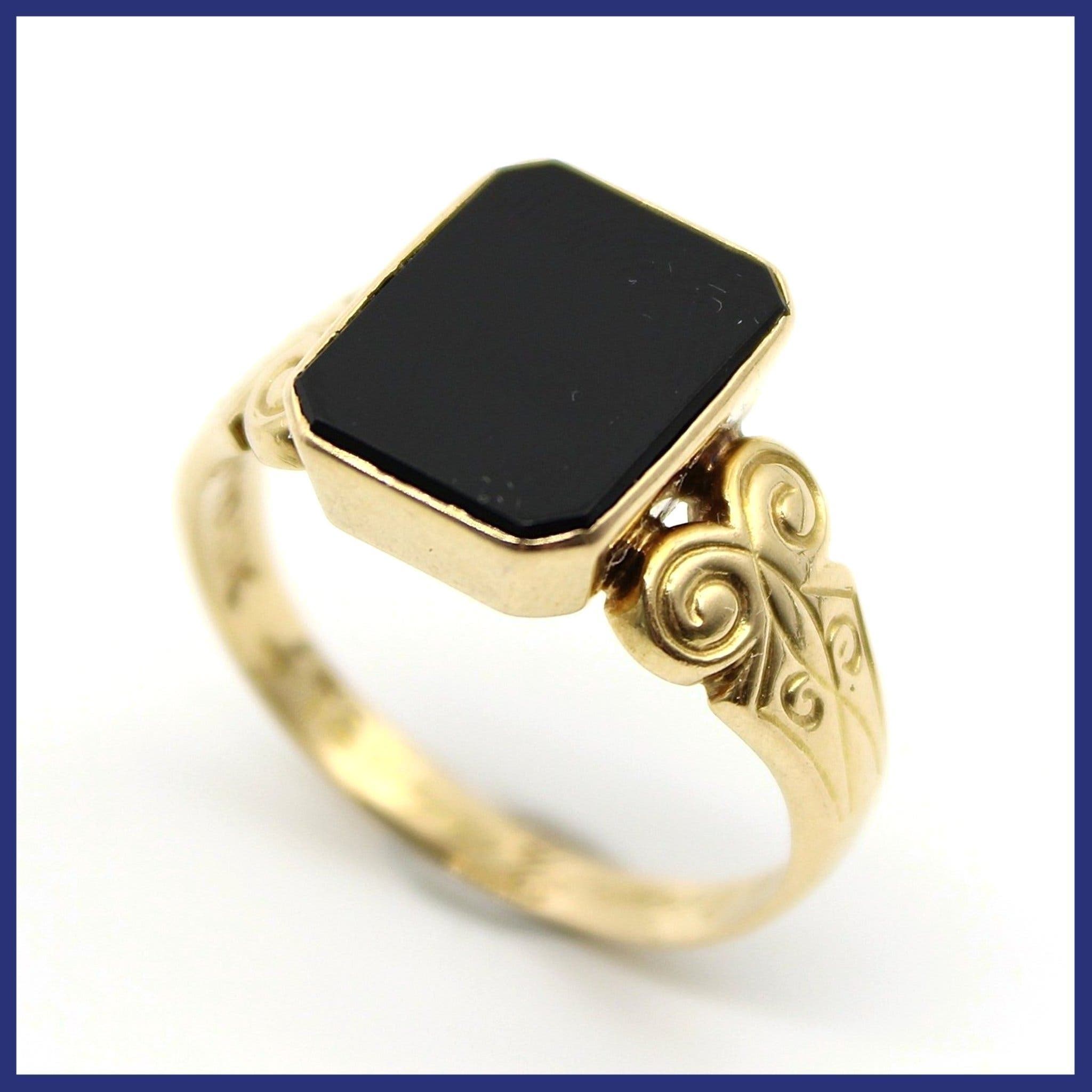Klackring, 18K guld, svart sten (vikt 5,9g, stl 19,4mm), vintage