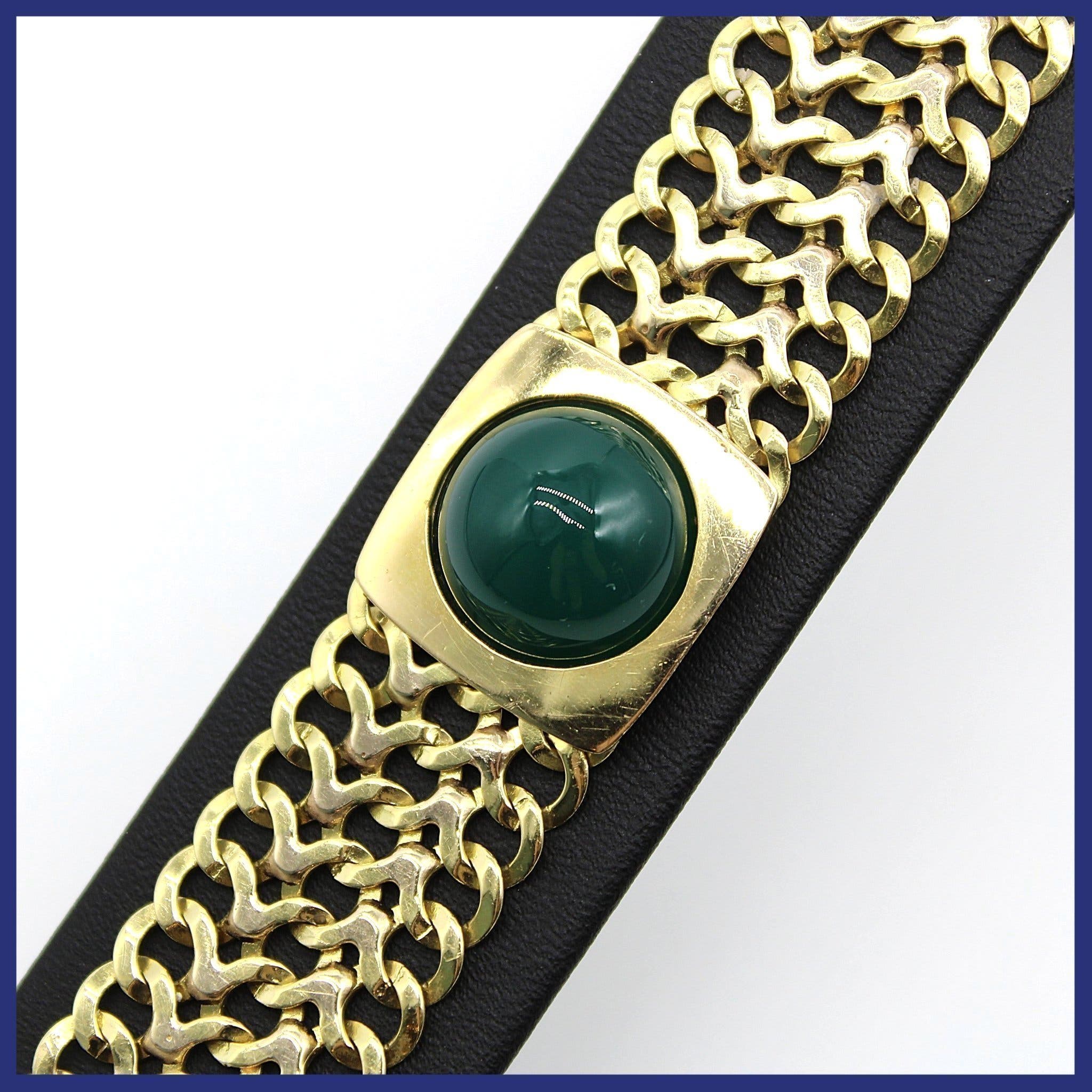 Armband, 18K guld, fiskben, grön cabochonslipad sten (35,67g, längd 18,5cm)