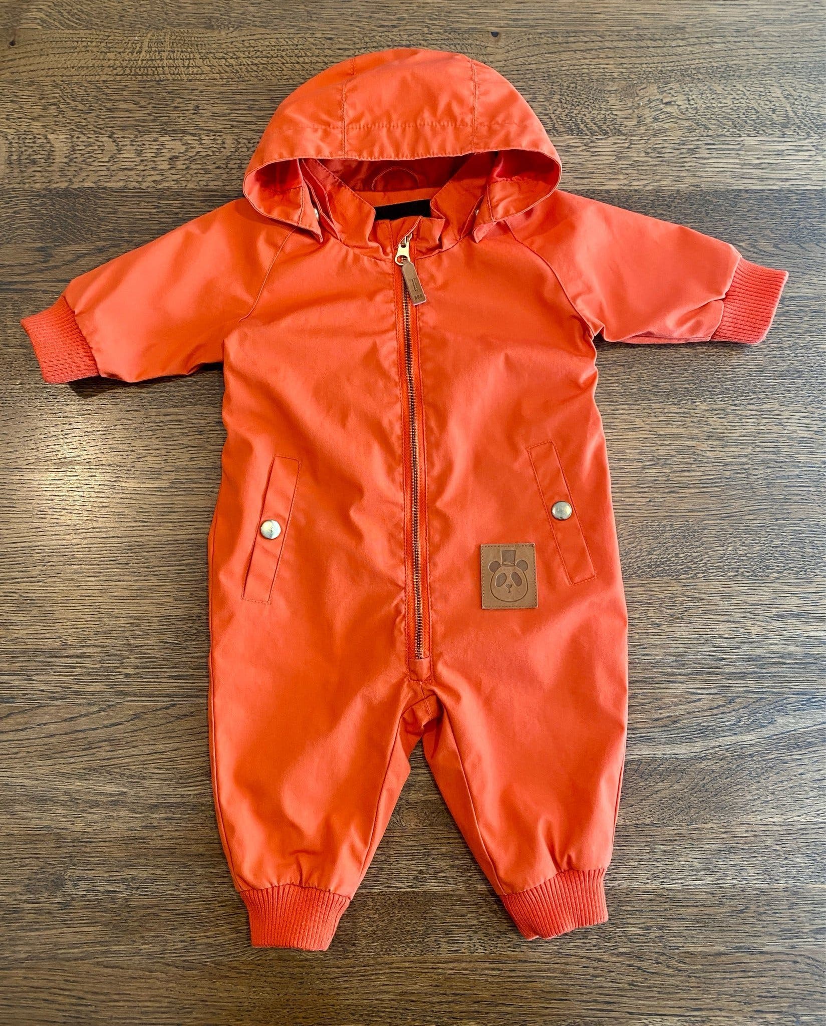 Mini Rodini Pico baby shell overall in orange size 56/62