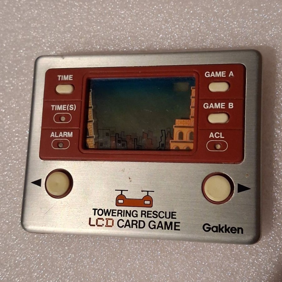 Gakken Towering Rescue LCD Card Game | Köp på Tradera (753937188)