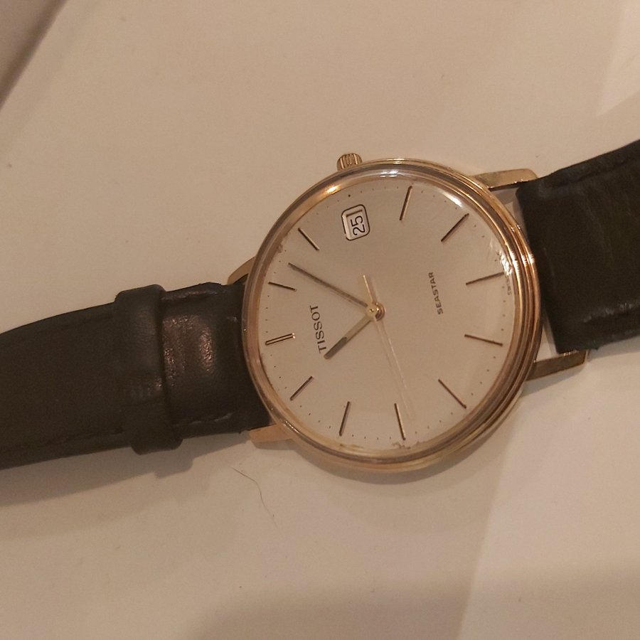 Tissot guldur top