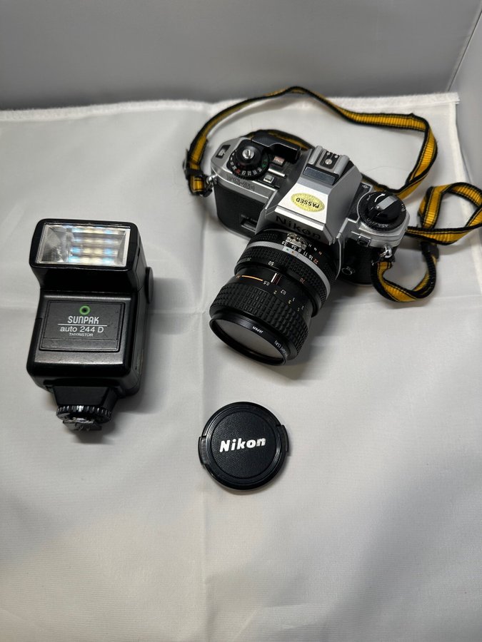 Se produkter som liknar Nikon FG-20 kamera med Zoom-N.. på Tradera 
