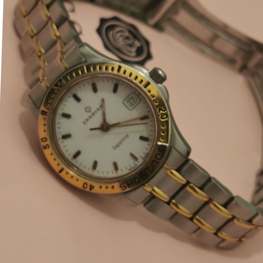 Candino sapphire Swiss Made klocka | Köp på Tradera (617865979)