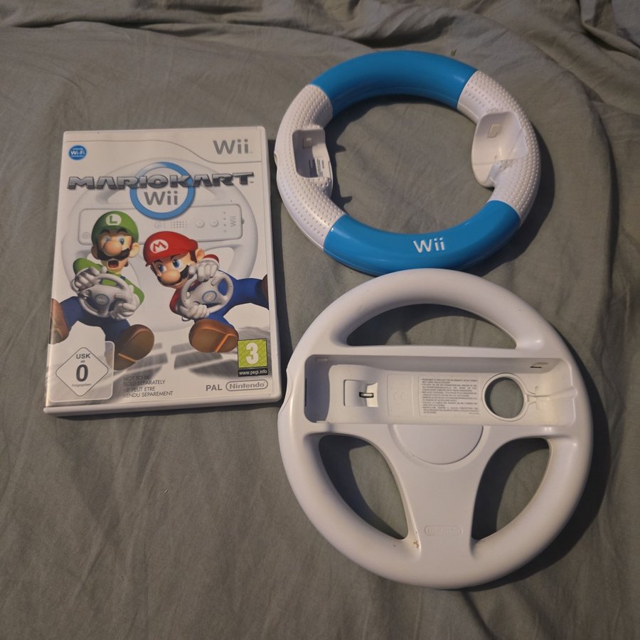 Se produkter, der ligner Mario Kart Wii komplett med på Tradera