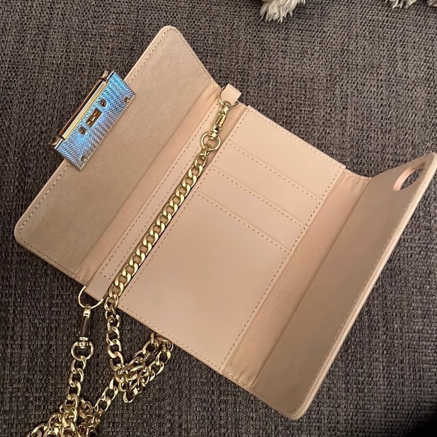 Se produkter som liknar iDeal of Sweden Kensington på Tradera