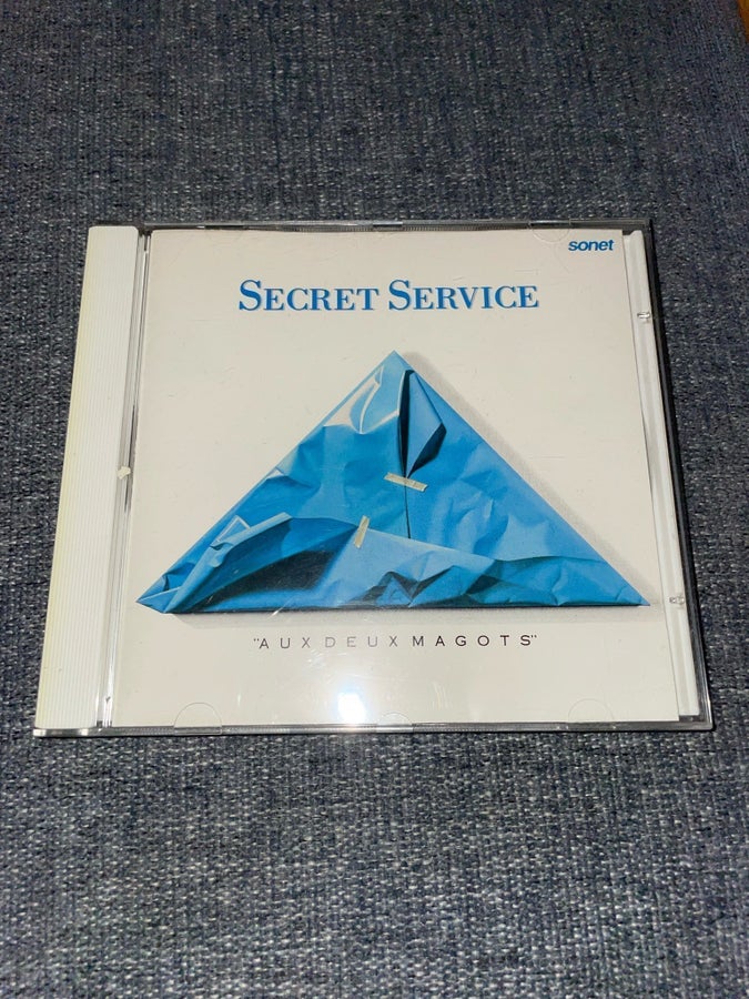 Secret Service - Aux Deux Magots CD Rare | Köp på Tradera (748594442)
