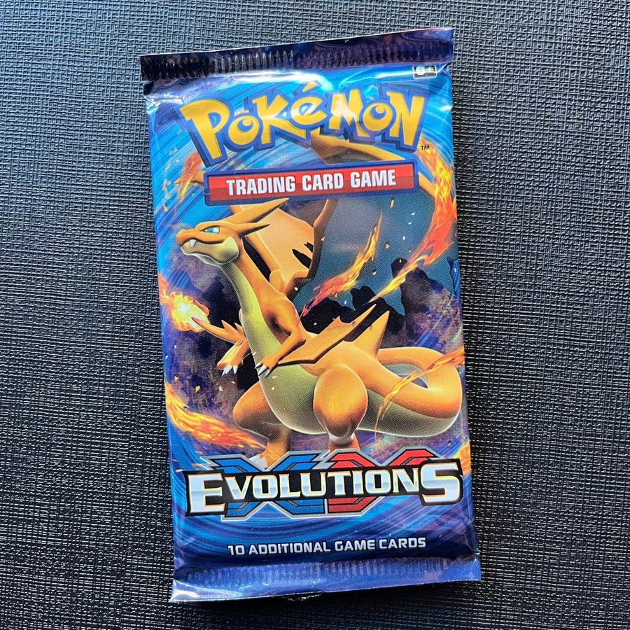 XY Evolutions Booster Pack Charizard | Oppnad/.. | Kp p Tradera  (729650891)