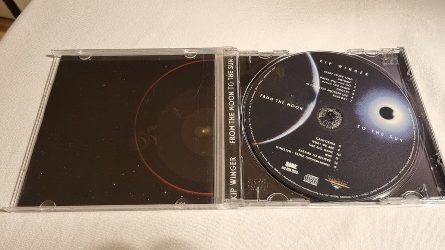 Kip Winger - From The Moon To The Sun | Köp på Tradera (708541184)