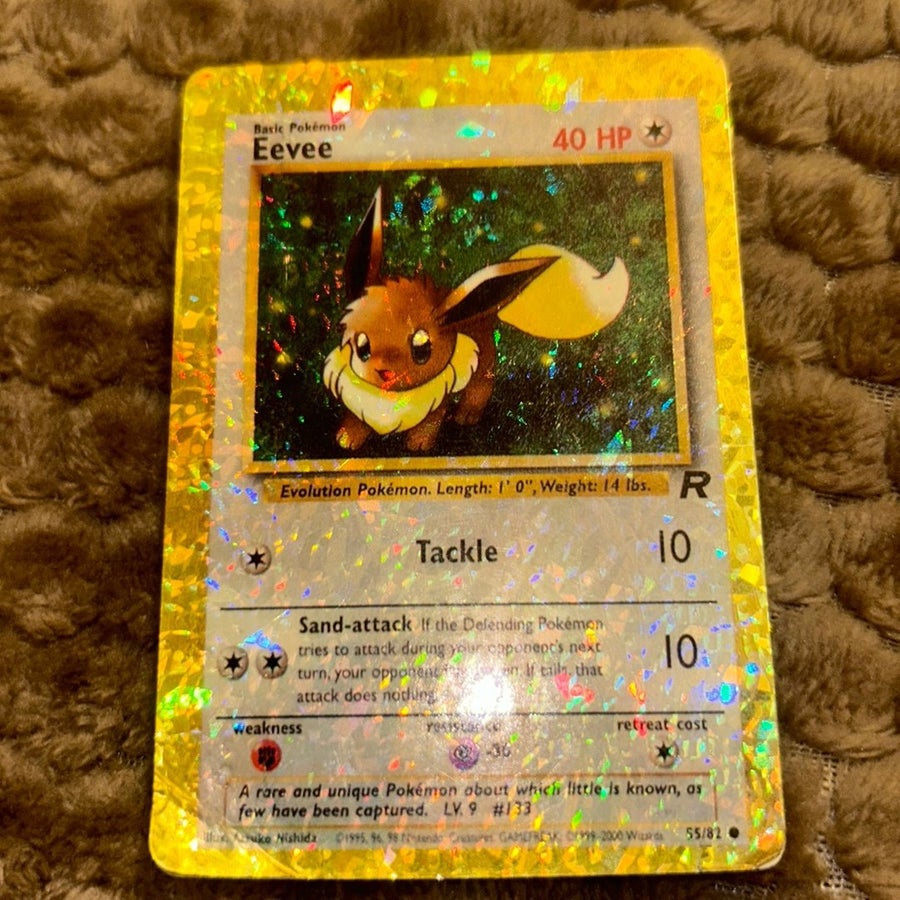 1995 eevee pokemon card value 55/82 search your deck for that evolves from Eevee that is the same type as the Energy card you attached to Eevee Eevee 1st Edition Team Rocket