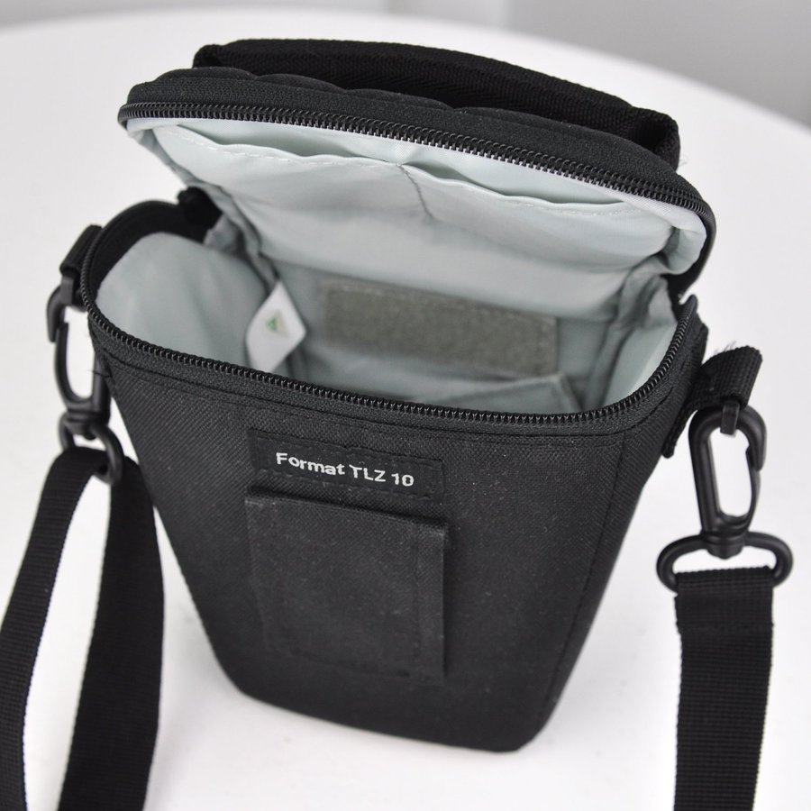 Se produkter som liknar Fotoväska LowePro Rezo TLZ 10 på Tradera