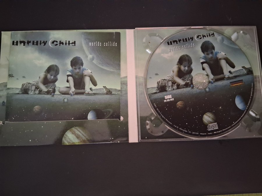 Unruly Child - Worlds Collide CD | Köp på Tradera (685177758)
