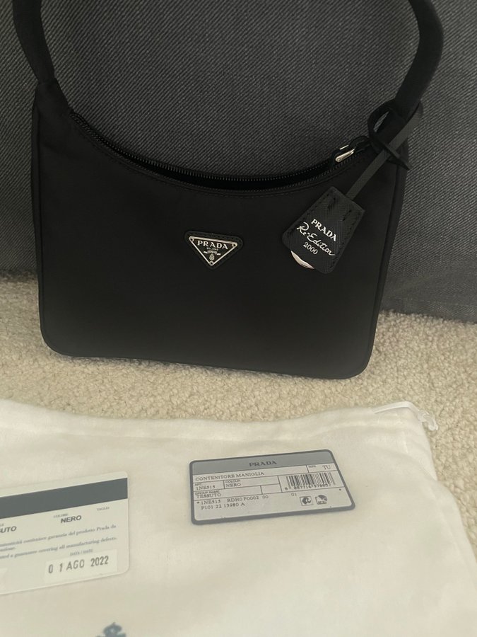ショルダーバッグ・ポシェット PRADA CONTENITORE MANIGLIA 1NE051 2DYC F0002 Tas Shoulder Bag Prada 1NE051 Contenitore Maniglia Outlet