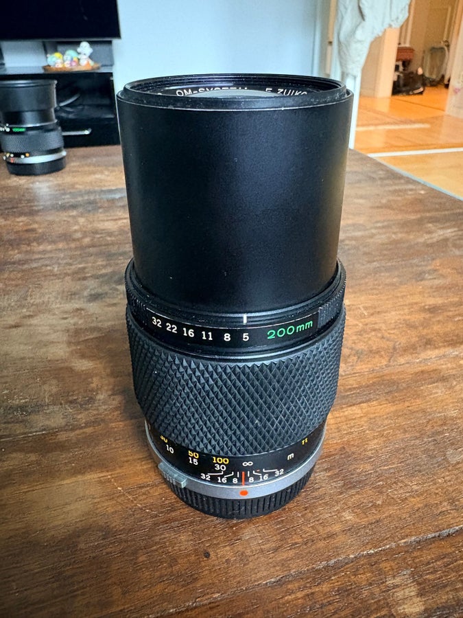 Olympus OM F Zuiko Auto-T 200mm f5 | Köp på Tradera (754917985)