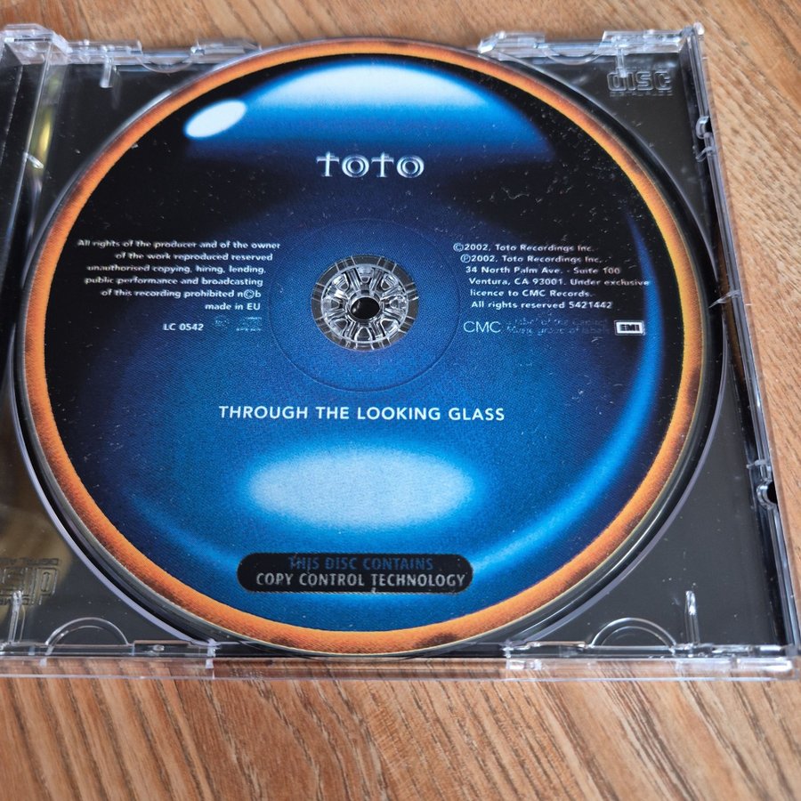 Toto - Through The Looking Glass CD | Köp på Tradera (714837343)