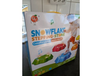 Snowflake Stepping-Stone med ljus och musik
