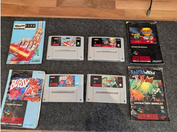 4 SNES-spel med originalmanualer, Earthworm Jim, Daffy Duck, Bubsy, Theme Park
