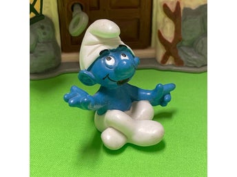 Smurf som mediterar eller utövar Yoga….fint lekt skick…
