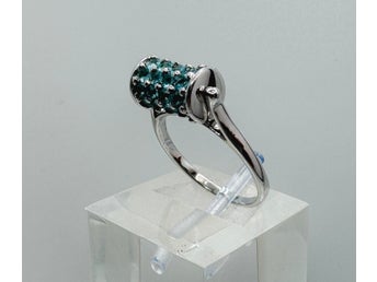 Designerring “La Luna Design” MDI silver med rörligt ringhuvud och blå topaser